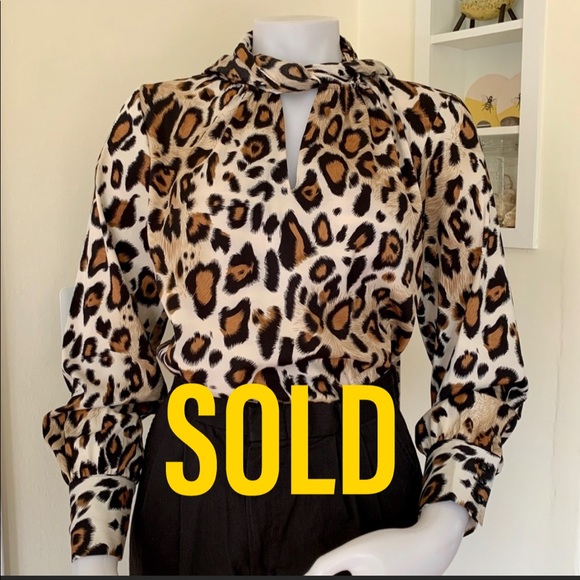 Joan Rivers Tops - SOLD Joan Rivers animal print secretary blouse